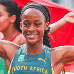 Tumi Ramokgopa, South African U20 hurdles champion, in action on the athletics track representing South Africa.